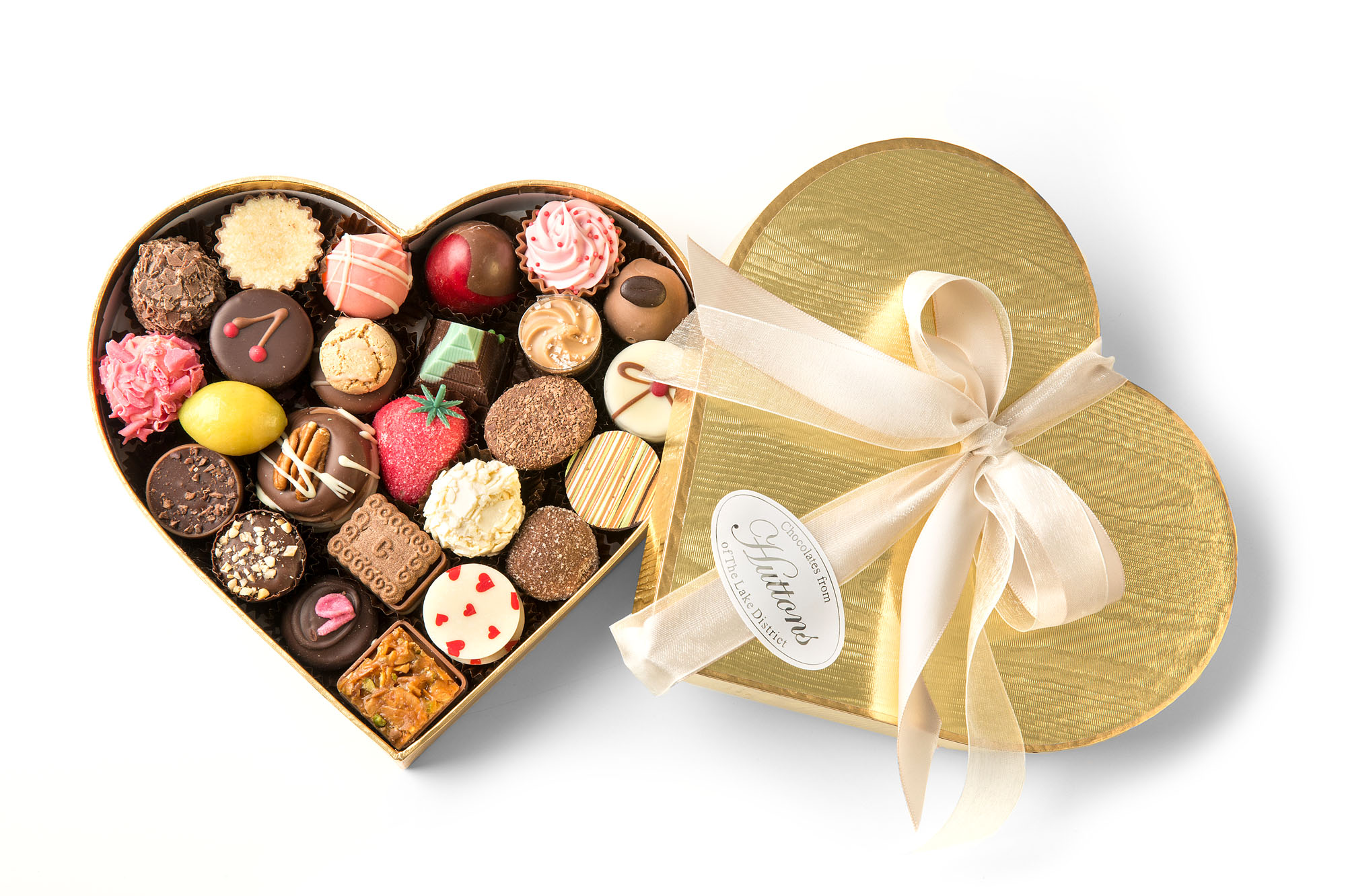 A luxury heart shaped chocolate box from godiva, filled with a selection of...