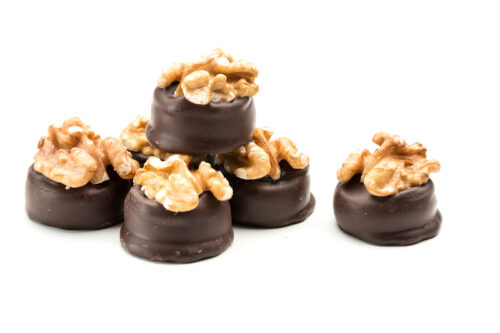 dark chocolate walnut creams topped with a whole walnut
