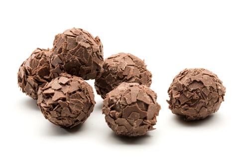 creamy ganach hand dipped in milk chocolate and rolled in milk chocolate flakes
