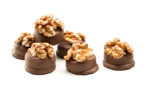 Milk chocolate walnut cream topped with a whole walnet