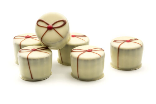 dark ganache infused with rasperry dipped in white chocolate